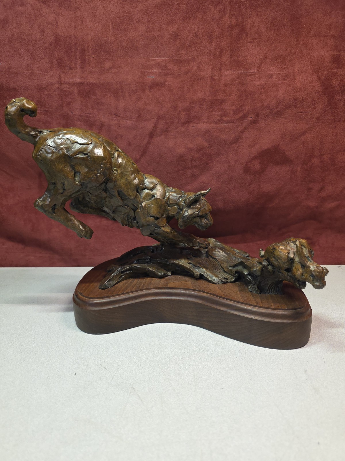 Claire Luster (Seattle Artist) Signed Bronze Sculpture Bobcat chasing a Rabbit