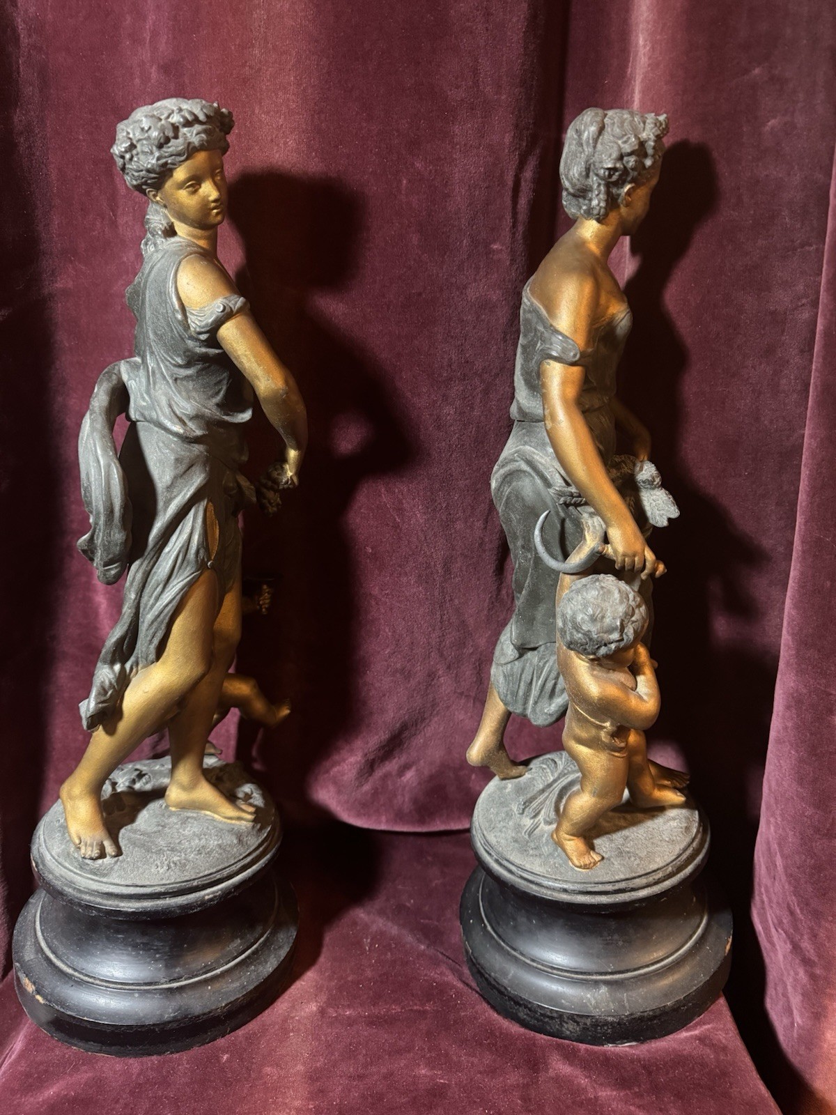 A Large Pair of Antique French Bronzed Spelter Allegorical Sculptures