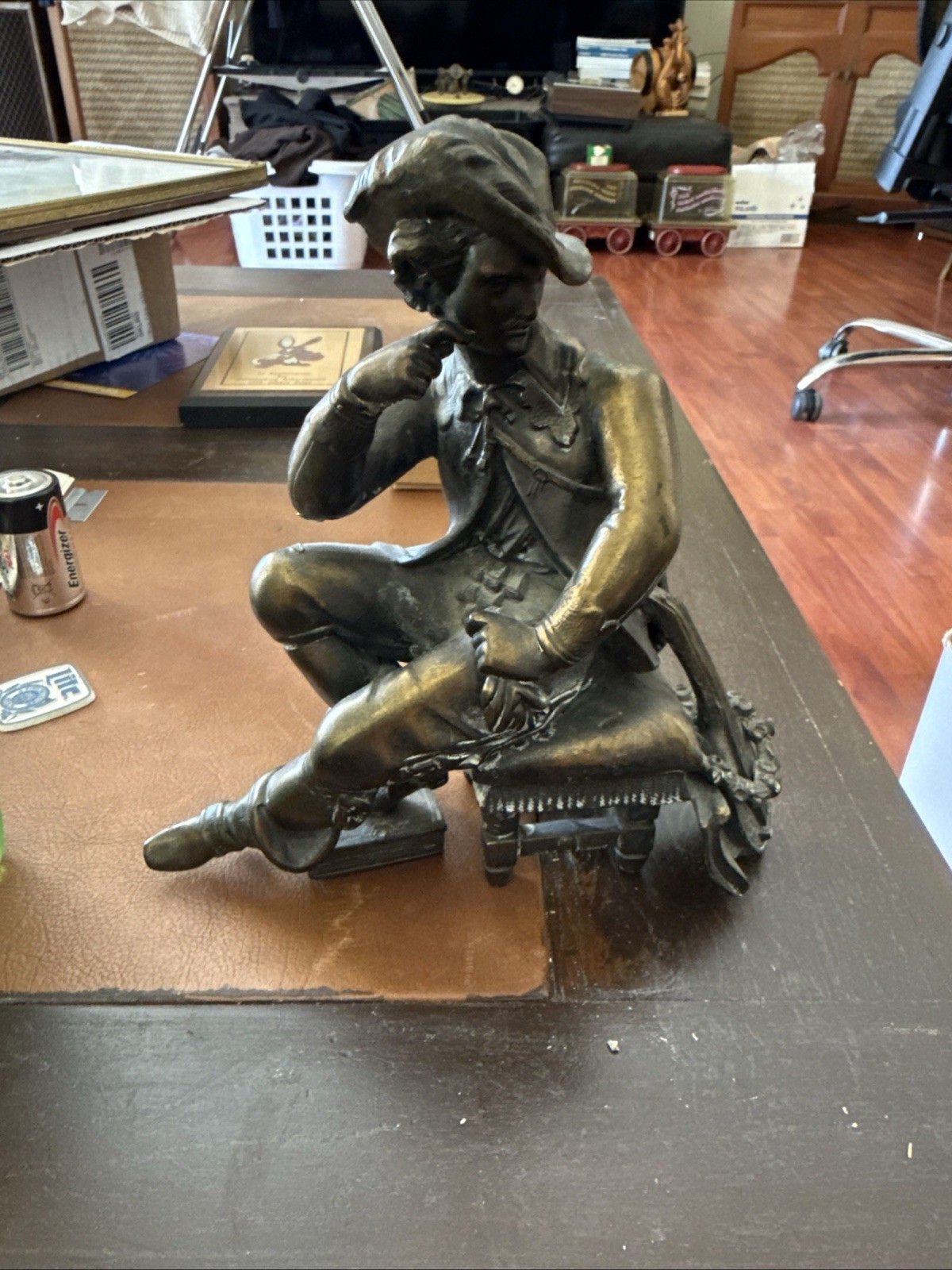 ANTIQUE BRONZE spelter figure depicting a 17th-century gentleman.