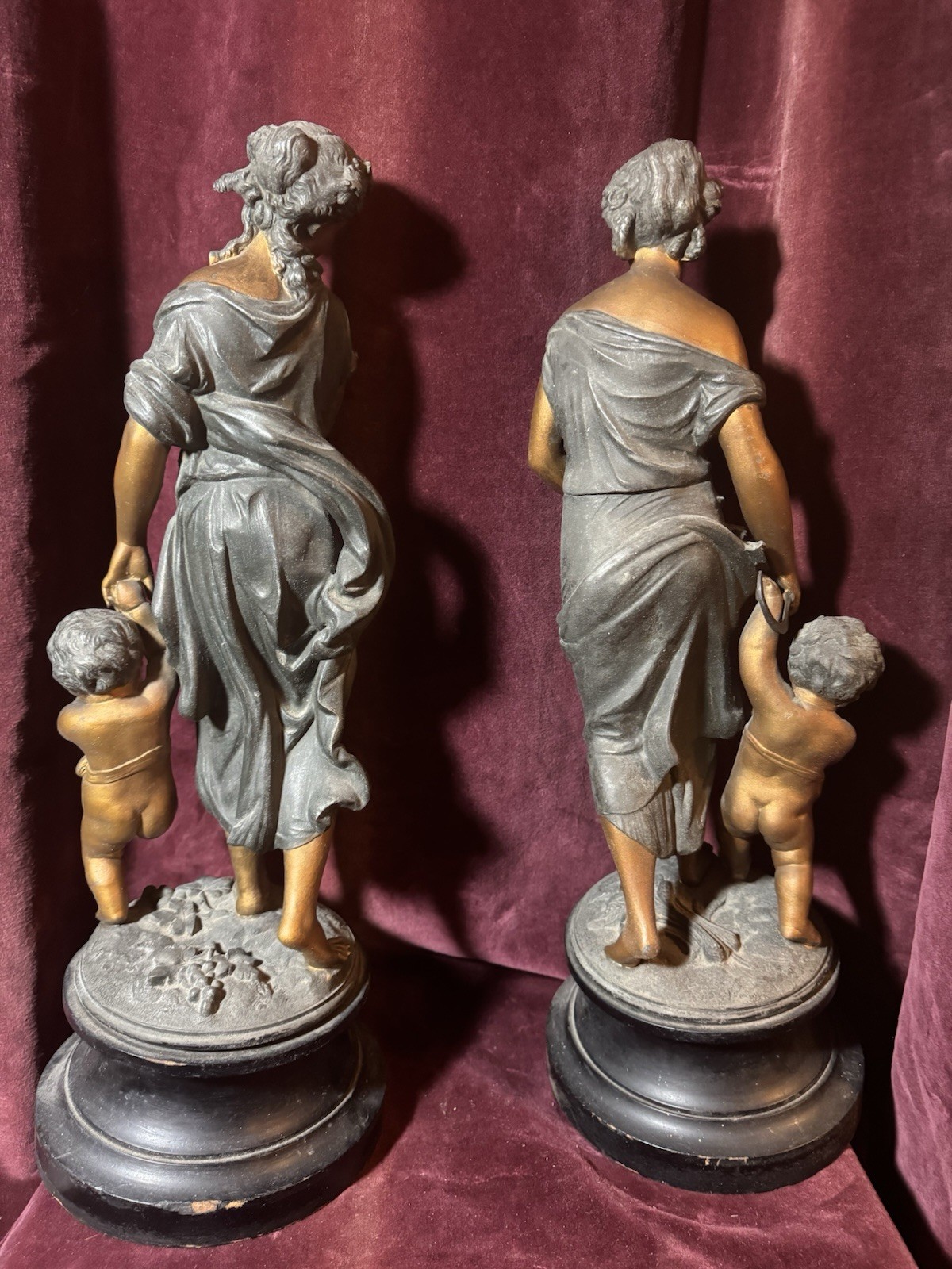 A Large Pair of Antique French Bronzed Spelter Allegorical Sculptures