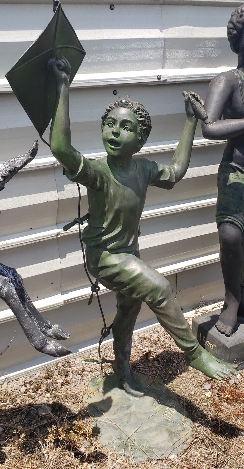 Free Standing Bronze Sculpture of Young Boy Flying a Kite GA11018