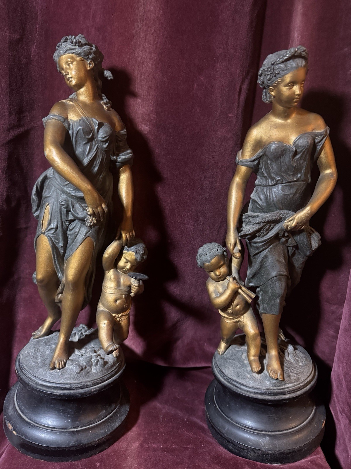 A Large Pair of Antique French Bronzed Spelter Allegorical Sculptures