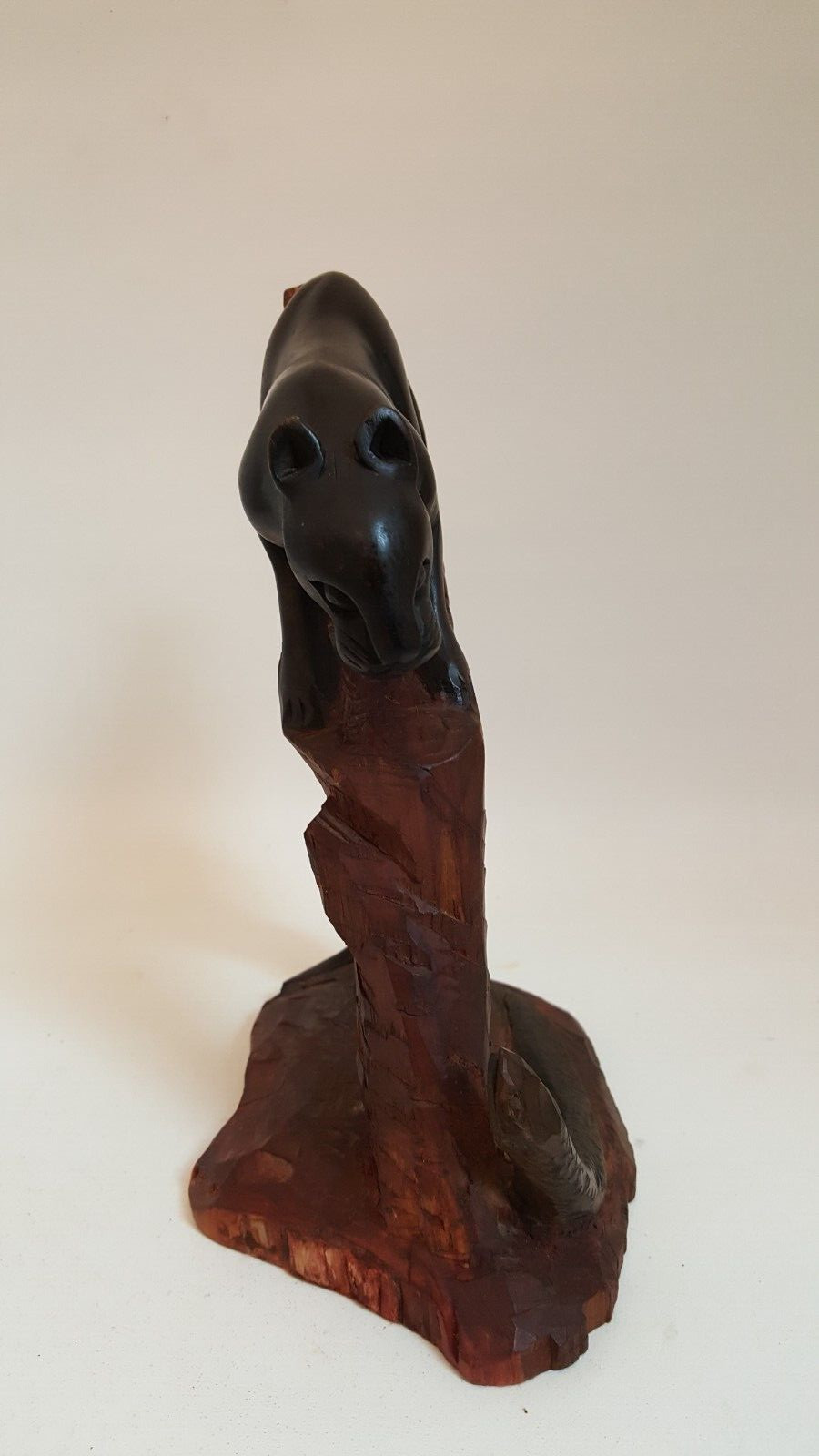 Vintage handcarved wood one piece black panther and snake sculpture signed