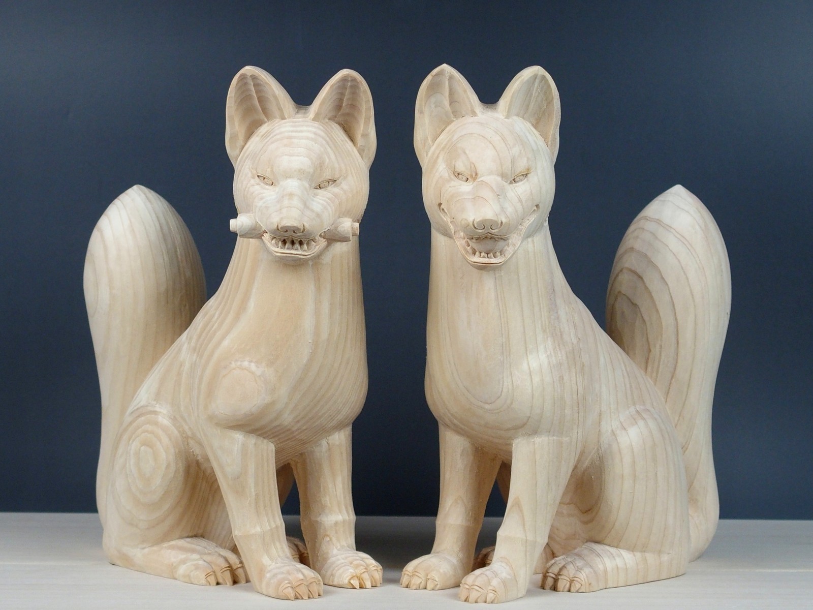 Foxes at the entrance to Japanese shrines: Inari foxes　messenger of God JAPAN