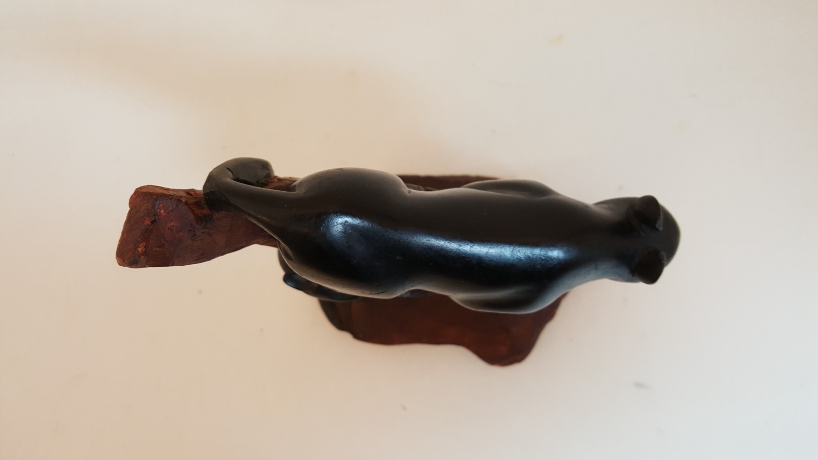 Vintage handcarved wood one piece black panther and snake sculpture signed