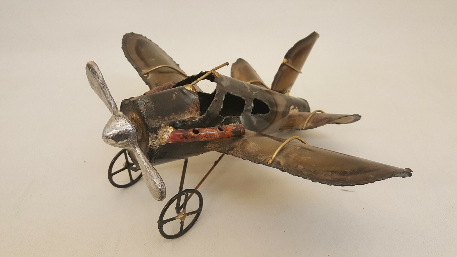 Metal airplane sculpture prop spins 13.5&Prime; wide artisan handcrafted