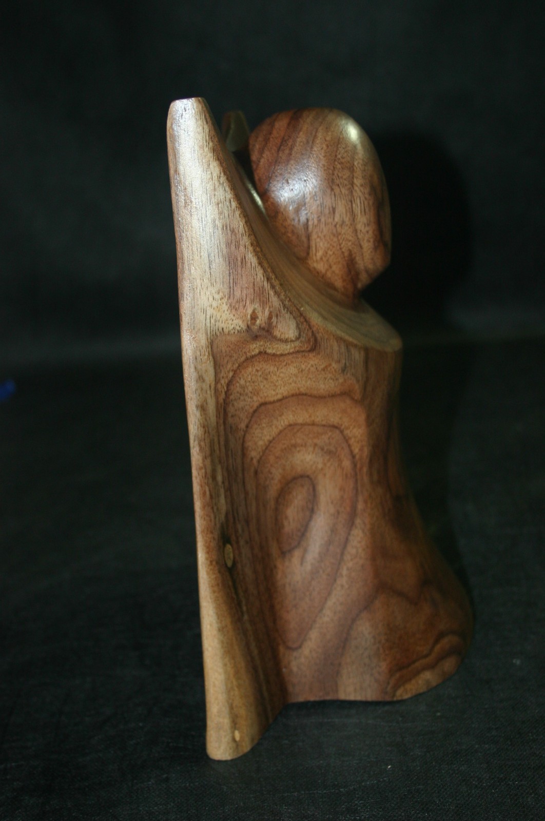 ABSTRACT CARVED WOOD-BLACK WALNUT-SCULPTURE PIECE SIGND MK AND DATED 11&Prime;H.7&Prime;W.